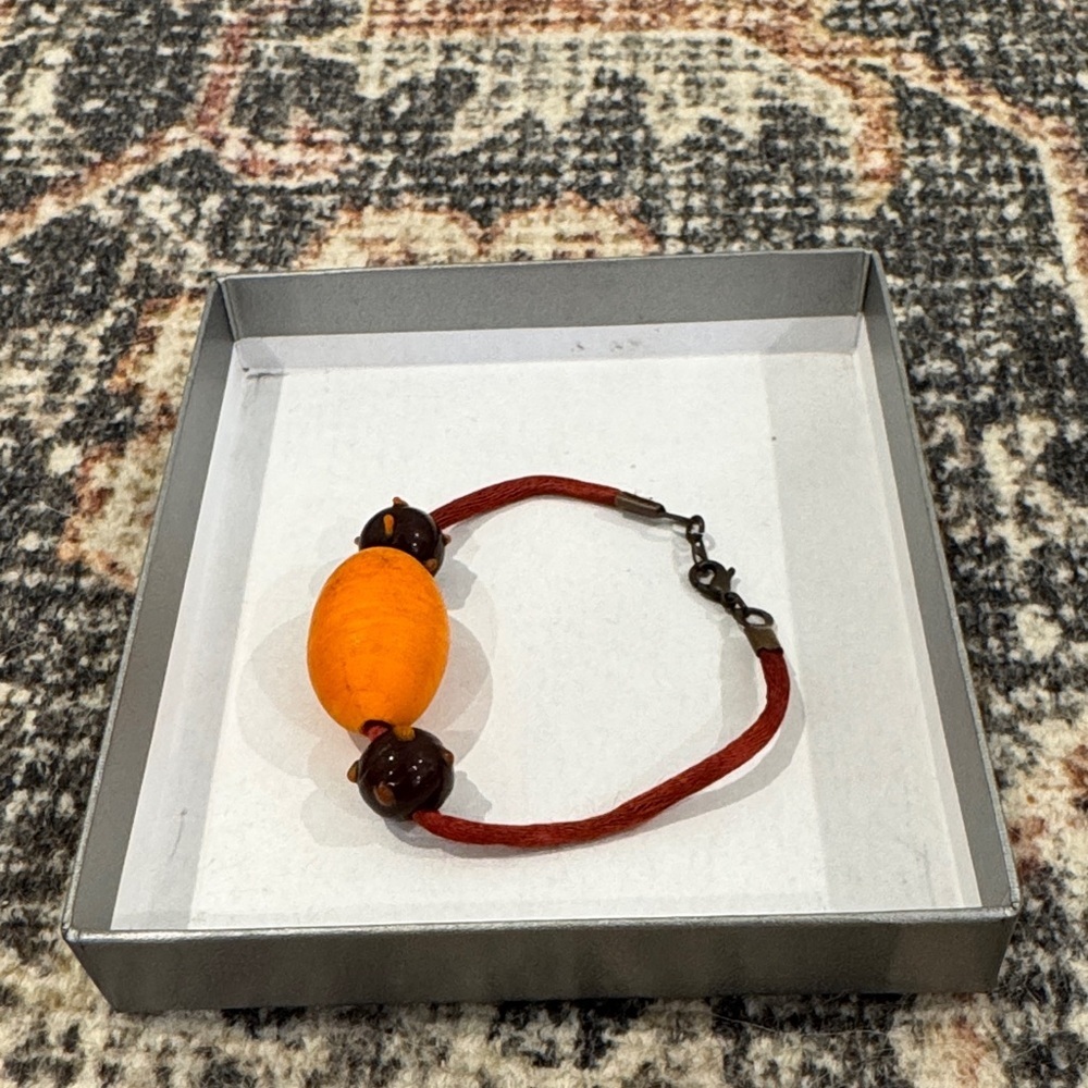 Orange and Brown Bracelet with Clasp Closure